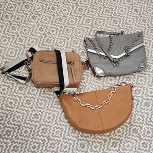 Sleek Tan Half-Moon Crossbody Bag with Chain Accent